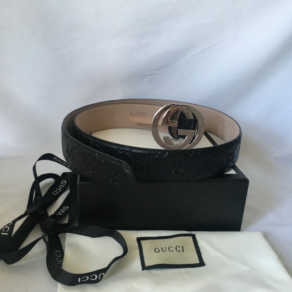 The Gucci Belt Is A Sophisticated Accessory, Featuring A Black Leather Strap Ado